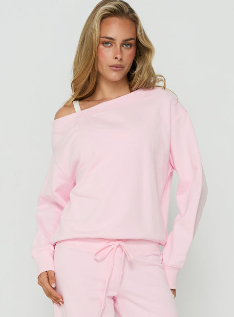Discover the Wellness Off The Shoulder Jumper Pink womens-jumpers with short length front view of model wearing Princess Polly