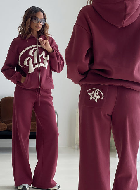 back view of model wearing Princess Polly Princess Polly Stargirl Wide Leg Sweat Pants Burgundy High Rise Pants 