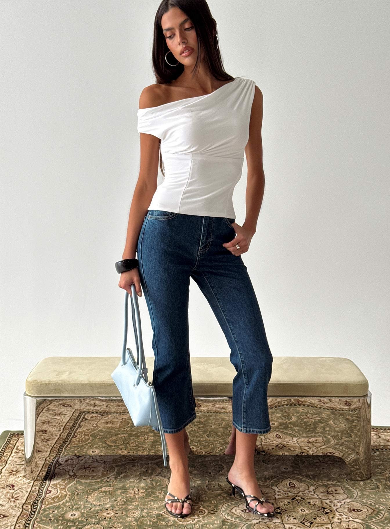 front view of model wearing Princess Polly Cindee High Rise Cropped Jeans Mid Blue Wash High Rise Jeans 
