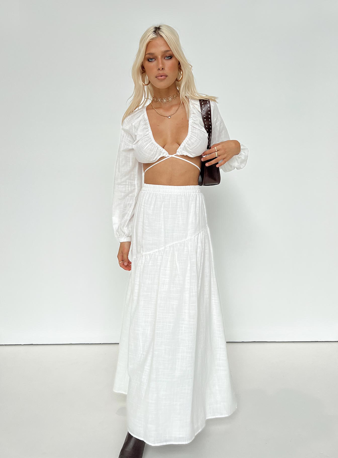 White matching set Long sleeve top Plunging neckline Adjustable coverage Tie fastening Maxi skirt Thick elasticated waistband Tiered skirt