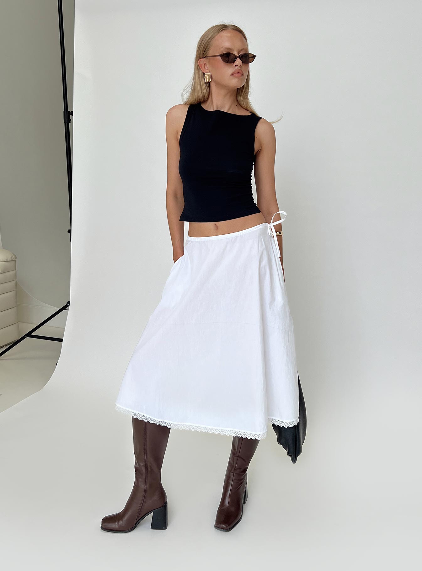   front view of model wearing Princess Polly Taka Midi Skirt White Midi Skirts 