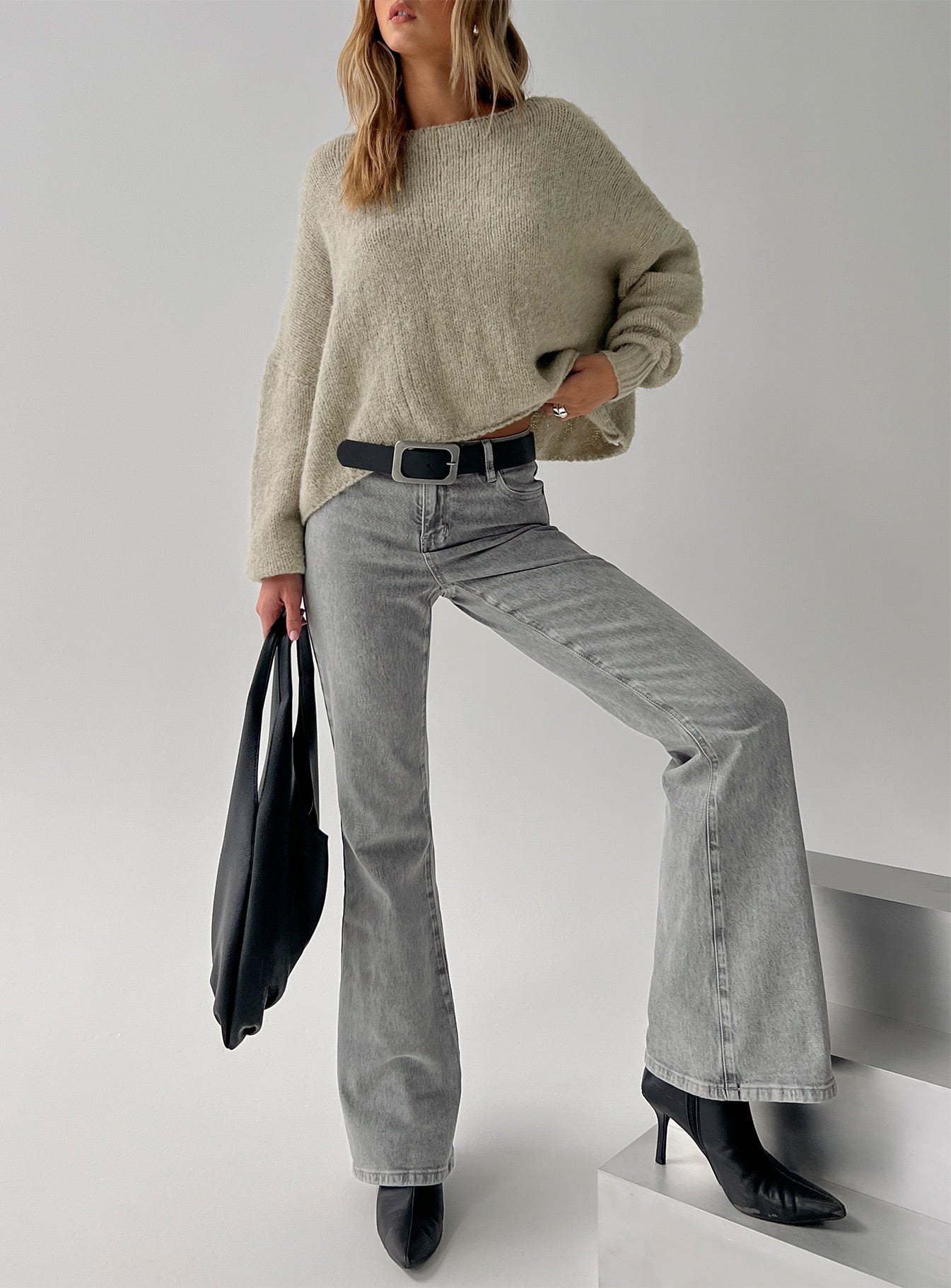 front view of model wearing Princess Polly Magic Mirror Mid Rise Bootleg Jeans Washed Grey Mid Rise Jeans 