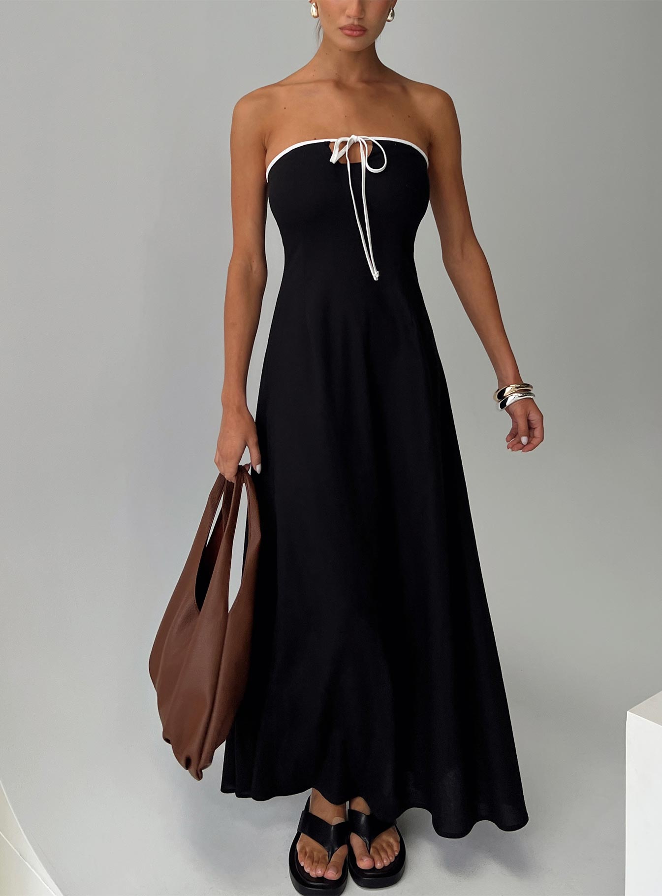 front view of model wearing Princess Polly Bijou Strapless Maxi Dress Black Straight Neck 