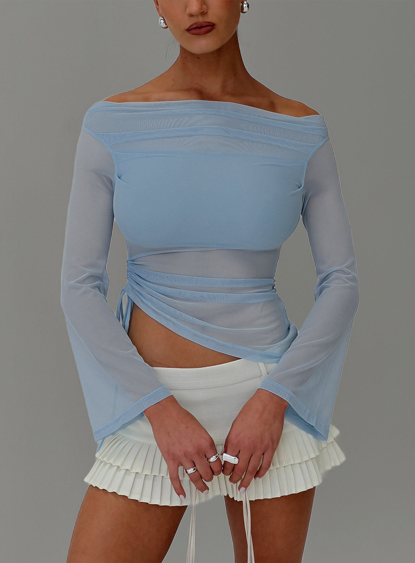 front view of model wearing Princess Polly Telescopic Off Shoulder Top Blue Full Sleeves straight 