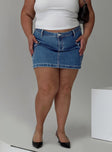   front view of model wearing Princess Polly Zakai Cargo Denim Mini Skirt Mid Blue Curve Mini Skirts 