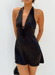 side view of model wearing Princess Polly Lanier Mini Dress Black Petite Plunger 