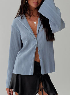 side view of model wearing Princess Polly Louie Pleated Shirt Blue Full Sleeves V-Neck 