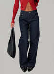 side view of model wearing Princess Polly Jankins Baggy Jeans Dark Blue Wash Mid Rise 