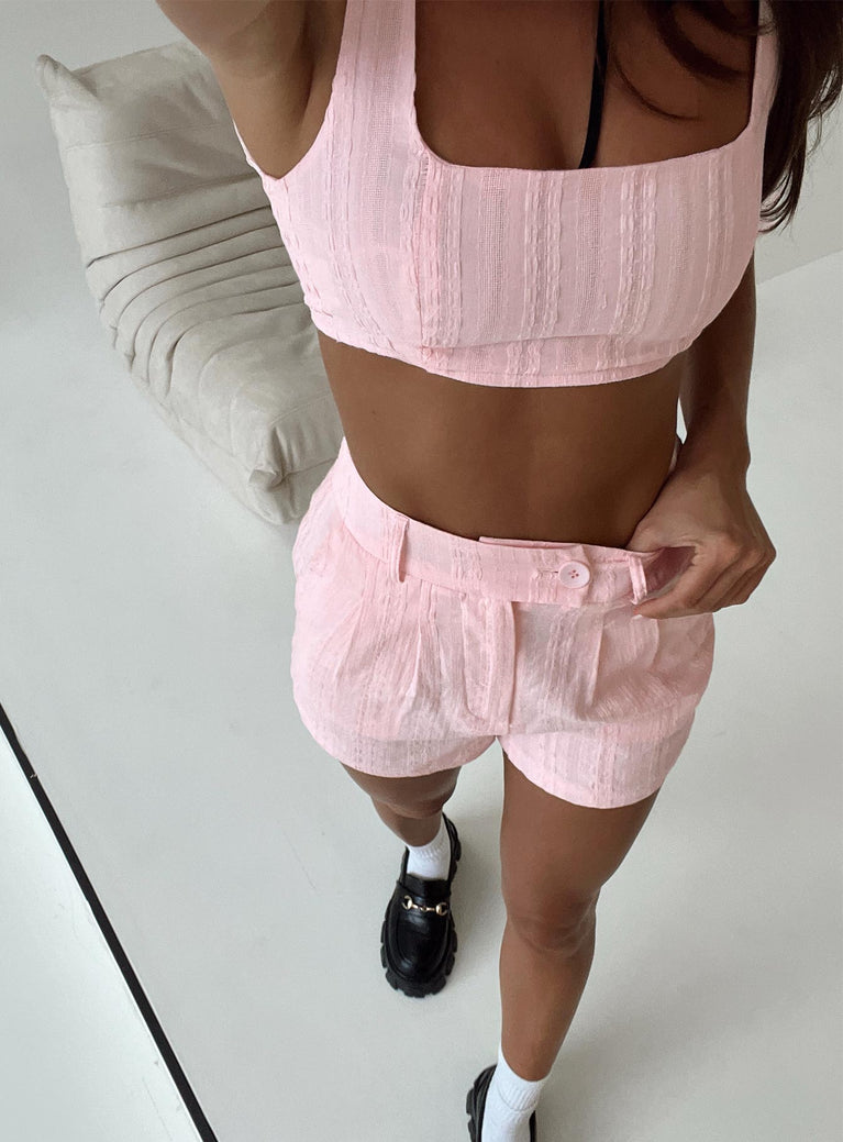 Matching set Crop top Fixed straps Invisible zip fasting at side High waisted shorts Belt loops at waist Zip and button fastening Subtle pleats at waist Twin hip pockets
