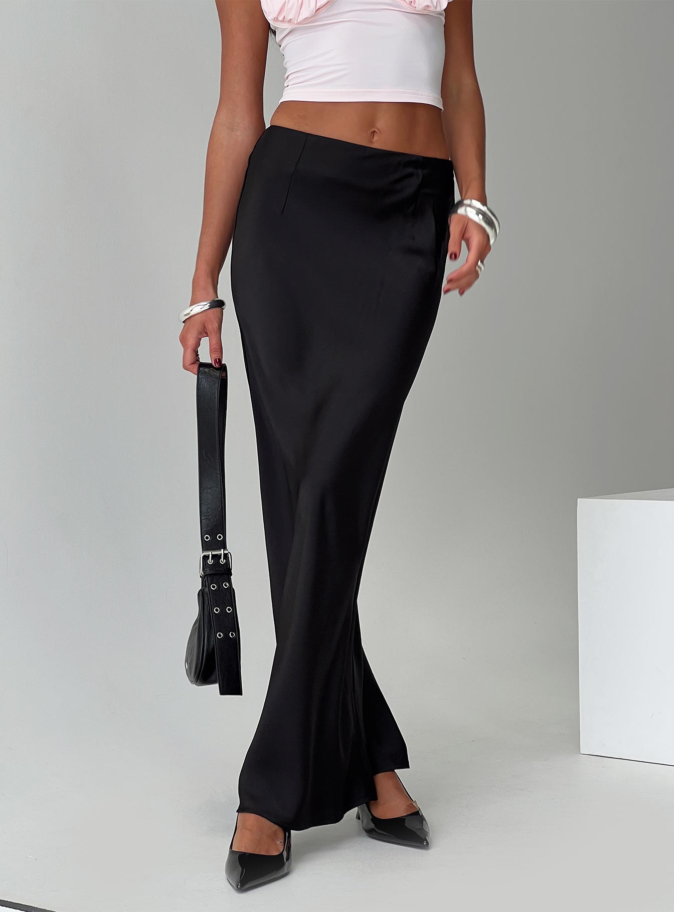 back view of model wearing Princess Polly Joder Maxi Skirt Black Maxi 