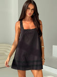 front view of model wearing Princess Polly Alanah Mini Dress Black Square Neck 