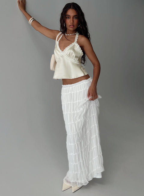   side view of model wearing Princess Polly Estefania Maxi Skirt White Maxi 