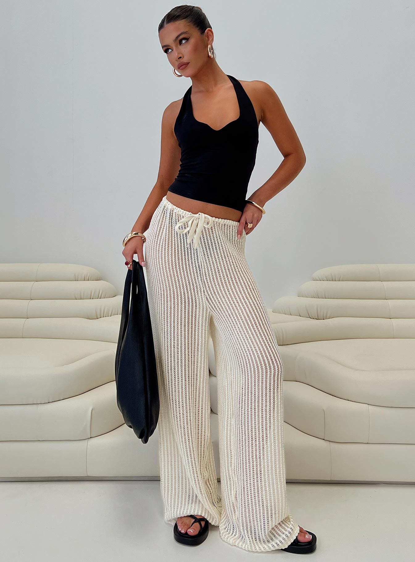 side view of model wearing Princess Polly Darcie Knit Pants Beige High Waisted Pants 