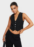 Vest top V-neckline, faux front pockets, button fastening at front Non-stretch, fully lined 