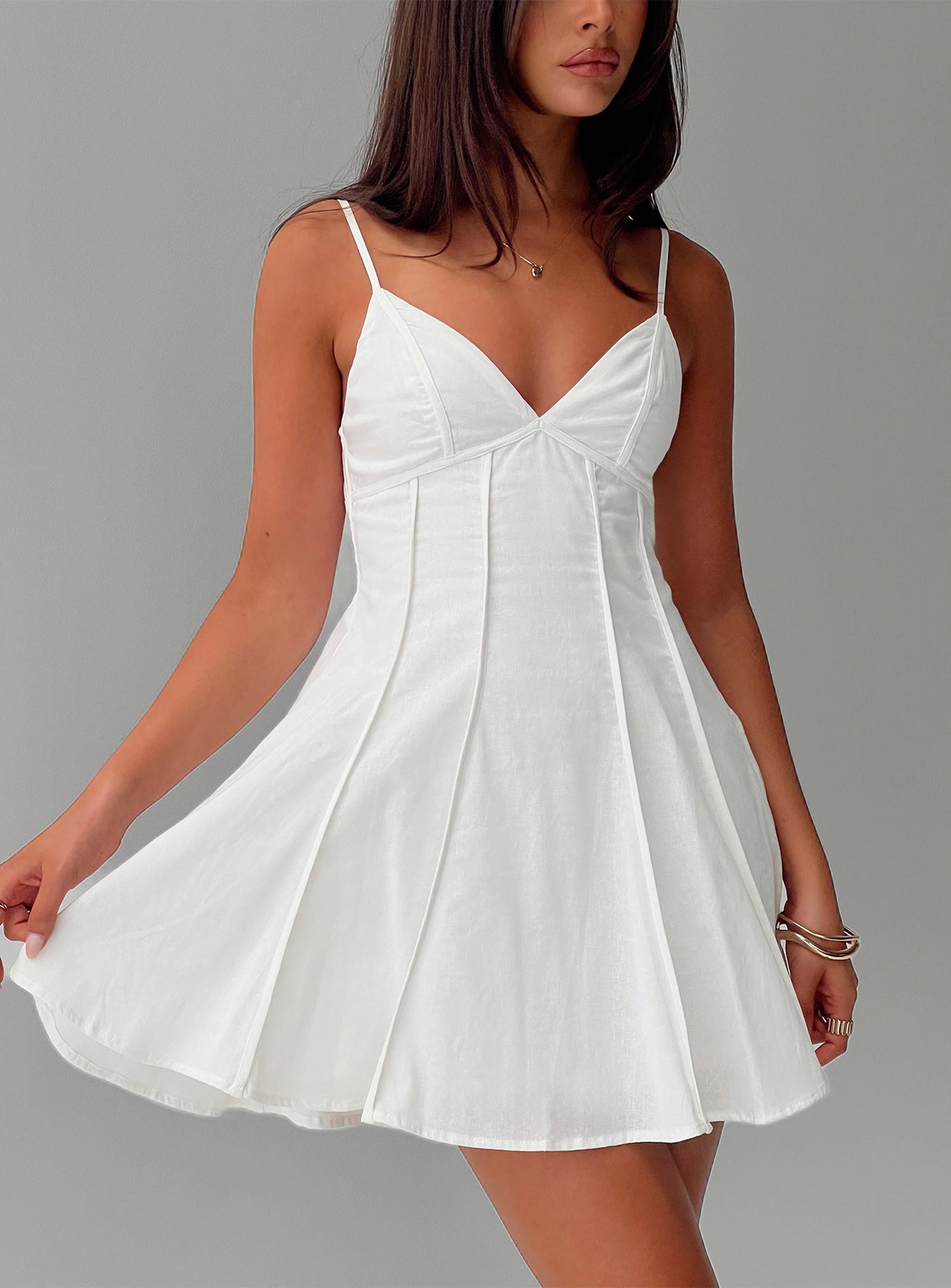 front view of model wearing Princess Polly Libertie Pleat Mini Dress White V-Neck 