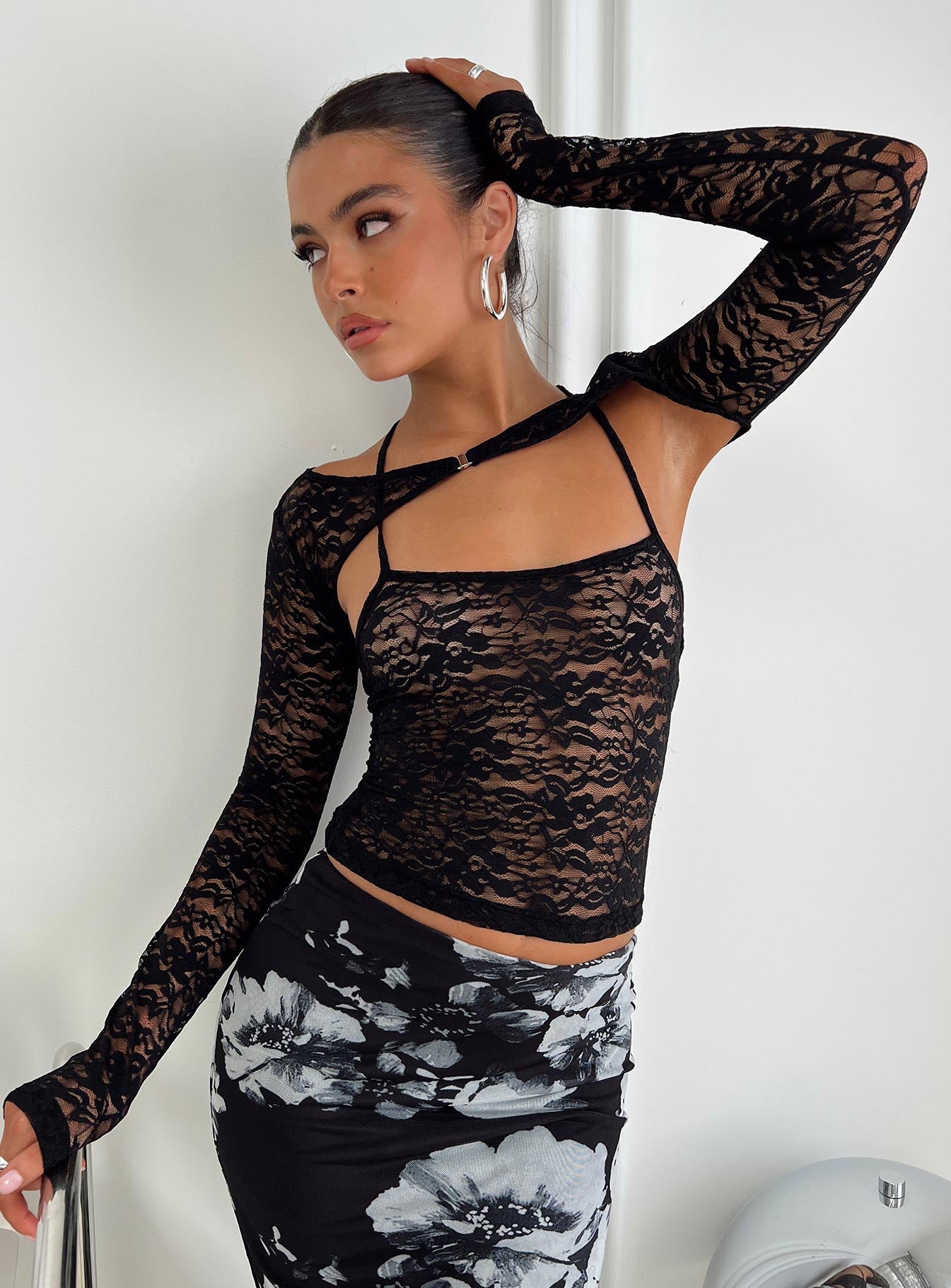 Front view of model wearing  front Princess Polly Full Sleeves Square Neck  Silveira Long Sleeve Lace Top Black