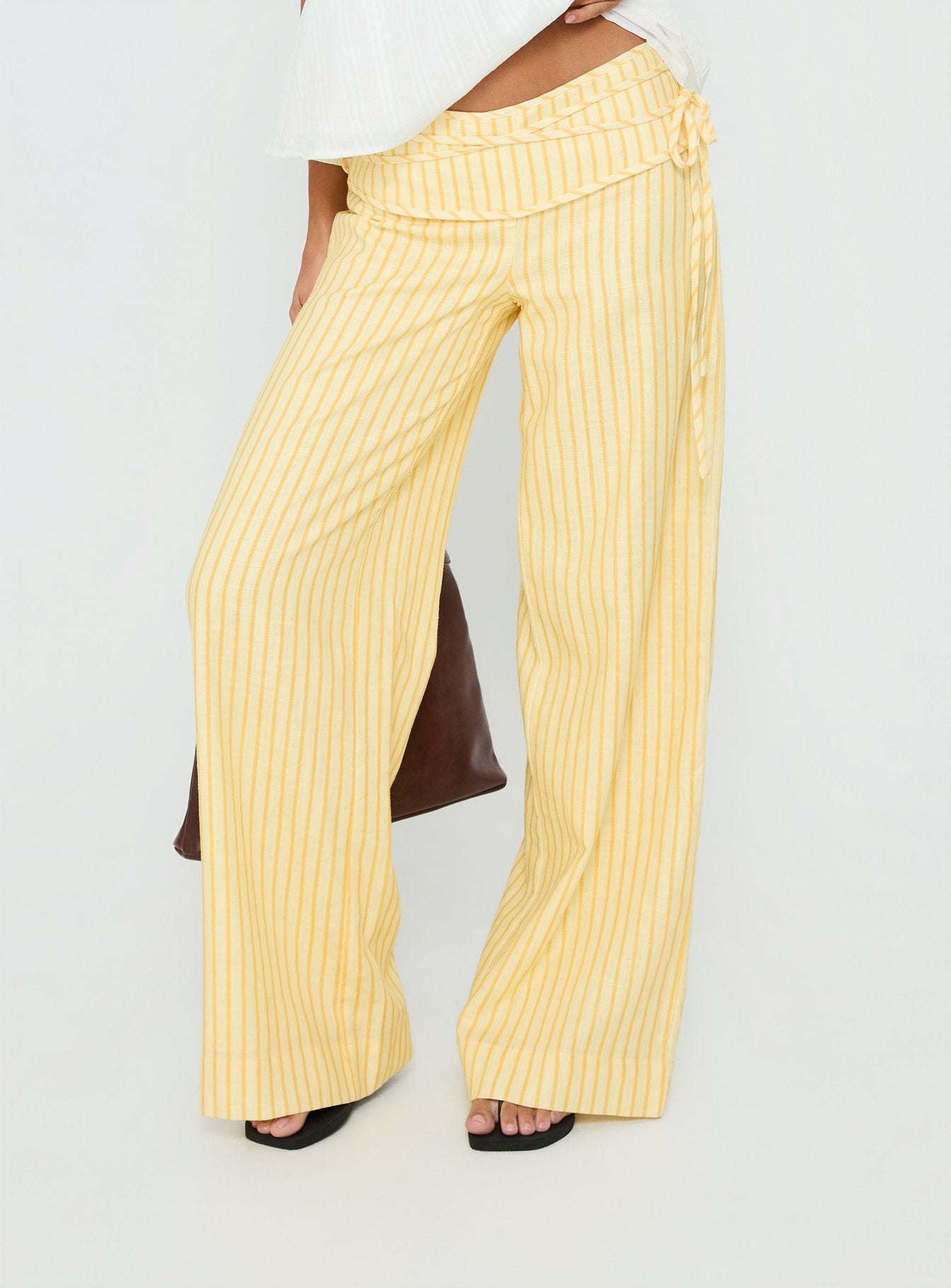 back view of model wearing Princess Polly Silver Moon Pants Yellow Stripe Low Rise Pants 