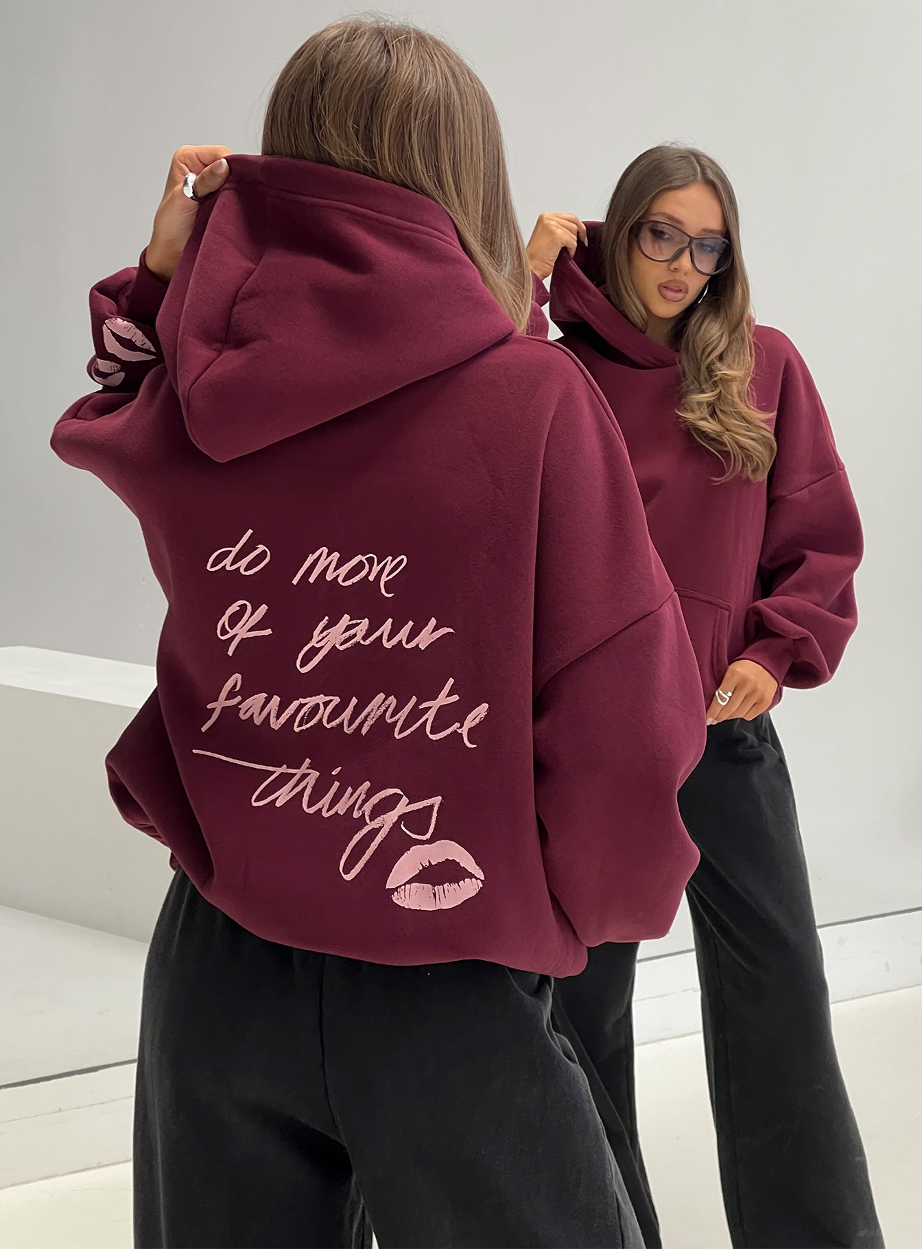 back view of model wearing Princess Polly Kisses Graphic Hoodie Wine Longline Jumpers 