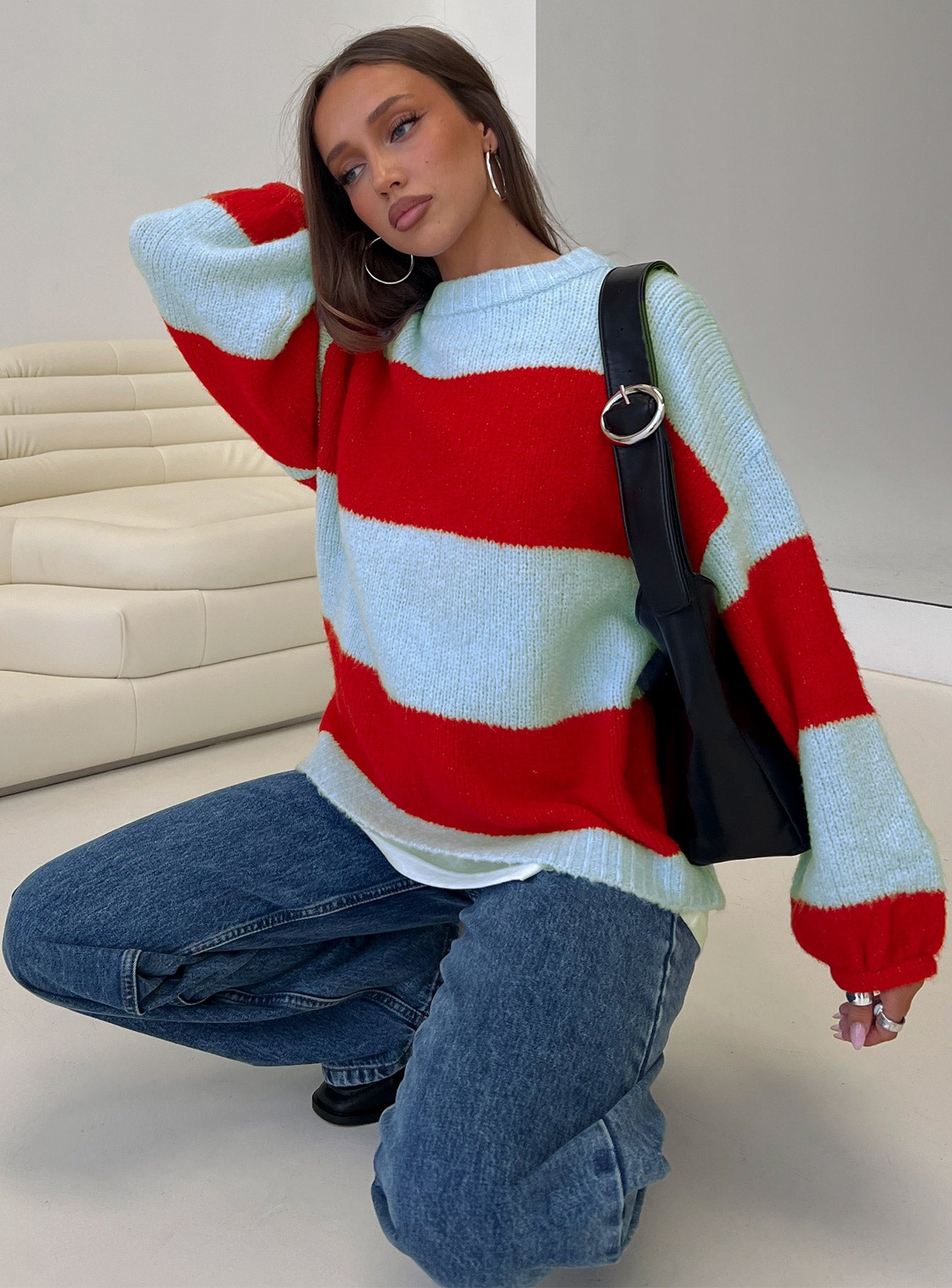 side view of model wearing Princess Polly Bastien Crew Neck Knit Sweater Blue / Red 