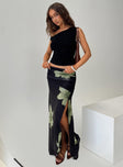   side view of model wearing Princess Polly Cooperi Maxi Skirt Black Floral Maxi 