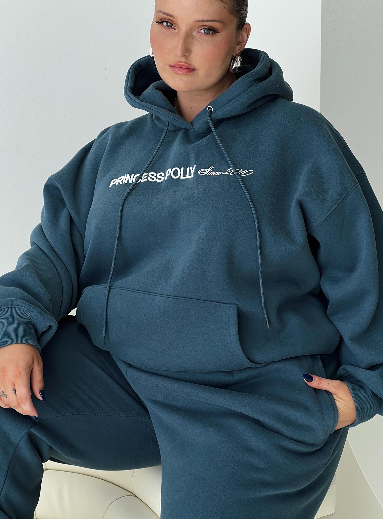 Princess polly hooded sweatshirt block / cursive text slate curve