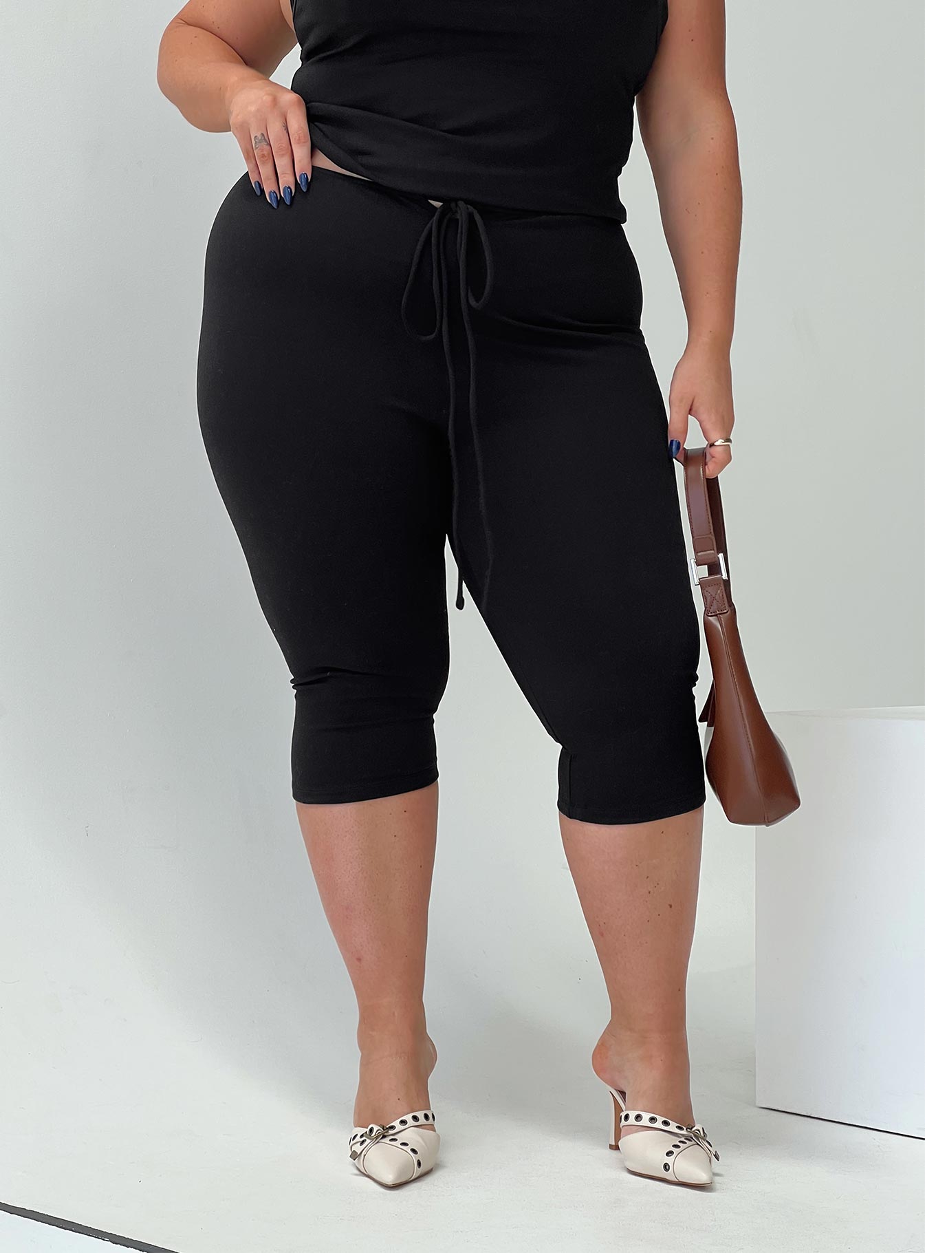 front view of model wearing Princess Polly Gisella Pants Black Curve High Waisted Pants 