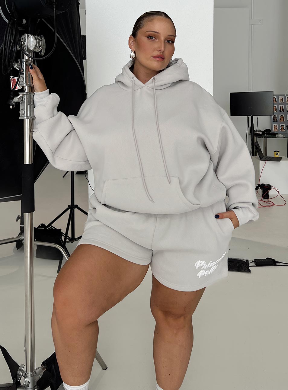 front view of model wearing Princess Polly Princess Polly Track Shorts Puff Text Grey Curve 