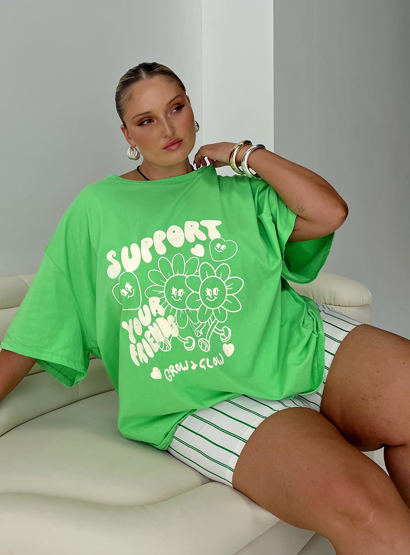 Thread together support your friends oversized tee green curve