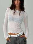 front view of model wearing Princess Polly Macgraw Long Sleeve Top White Full Sleeves Crew Neck 