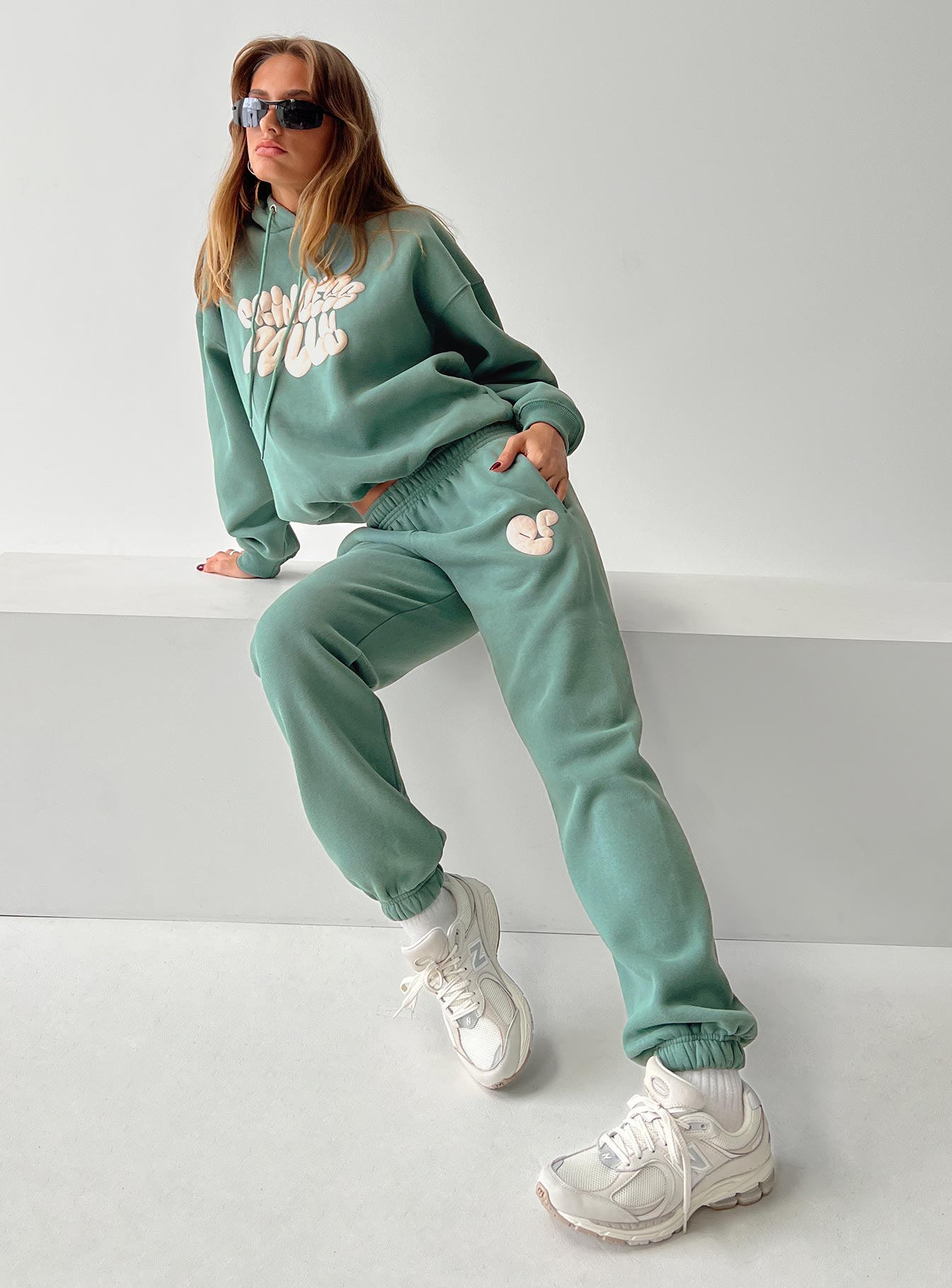 Princess polly track pants bubble text sage / eggshell