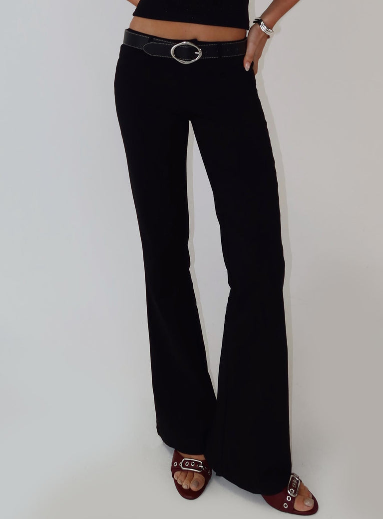 side view of model wearing Princess Polly En Route Pants Black Low Rise Pants 