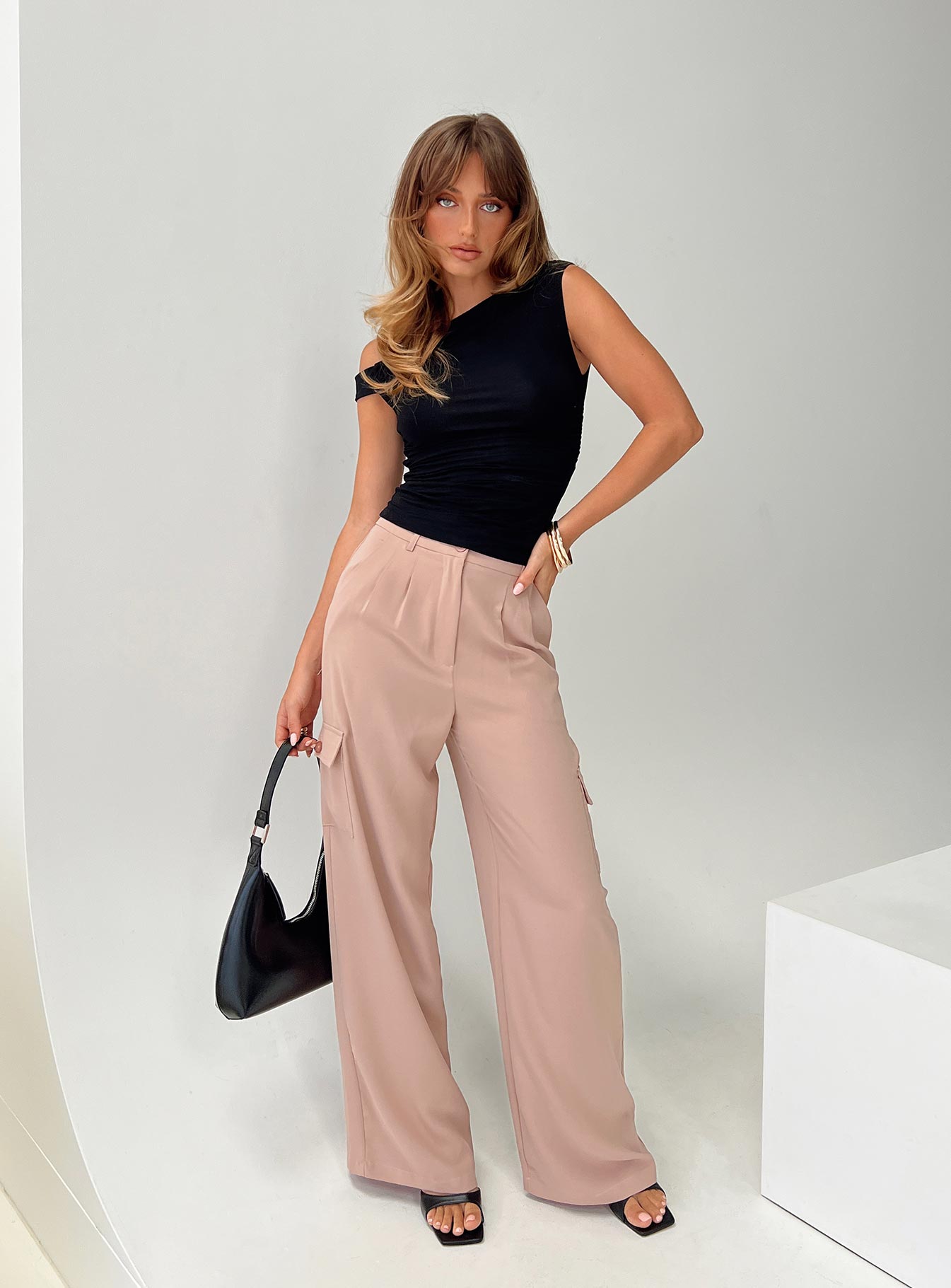 front view of model wearing Princess Polly Wallom Cargo Pants Beige High Waisted Pants 