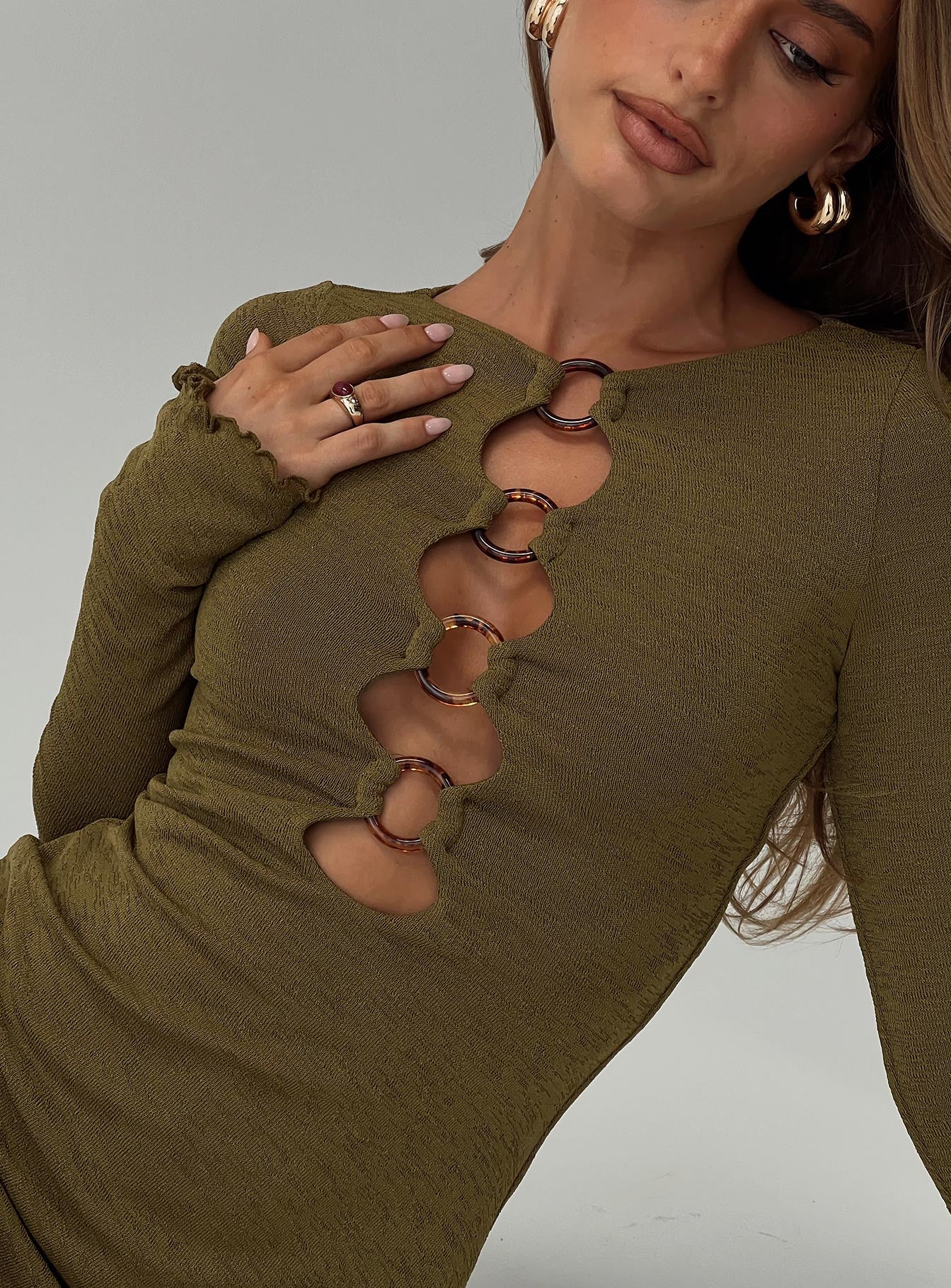 back view of model wearing Princess Polly Dejonge Ring Mini Dress Olive Crew Neck 