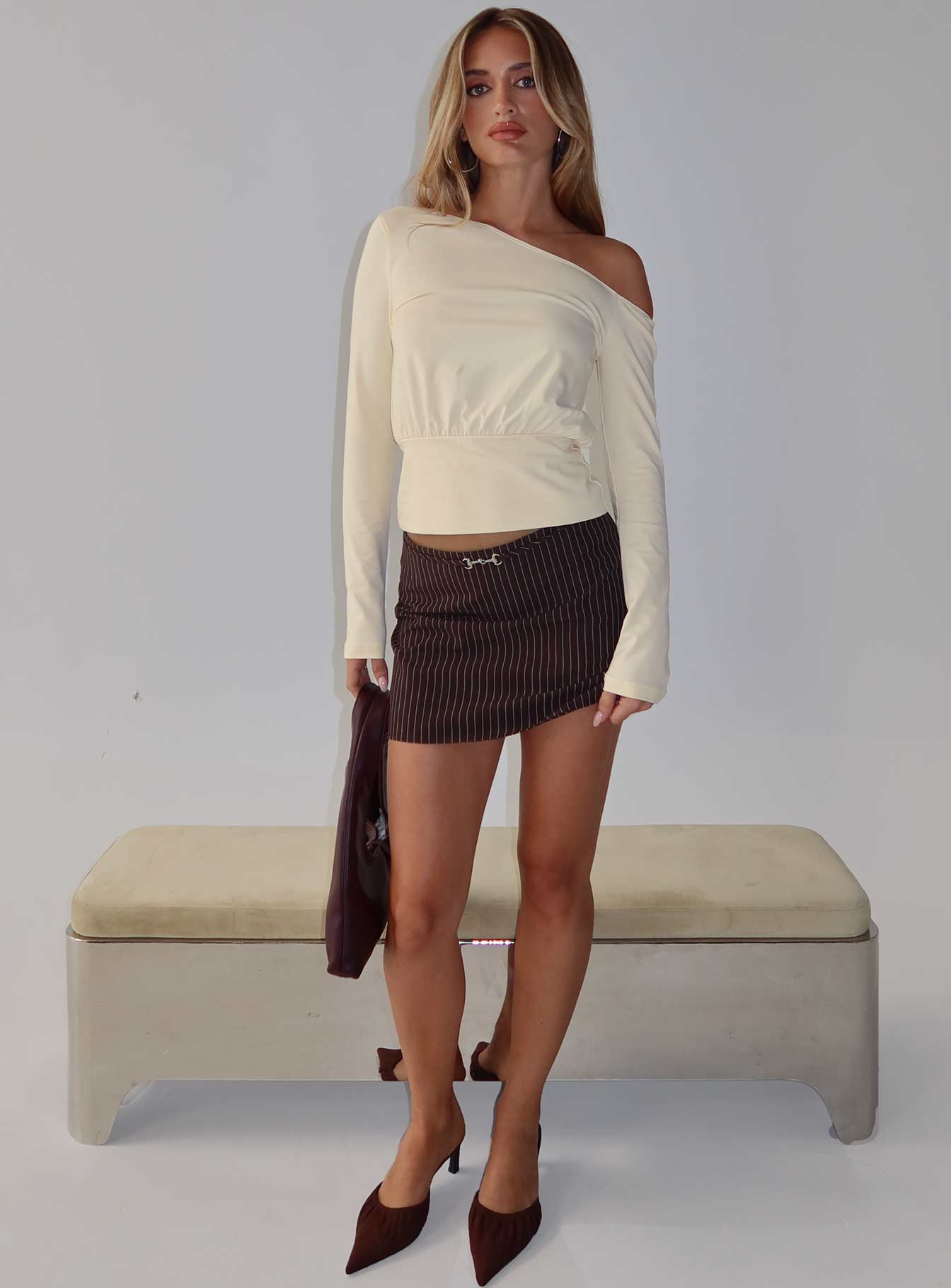   front view of model wearing Princess Polly Yellena Buckle Mini Skirt Brown Pinstripe Mini Skirts 