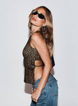 side view of model wearing Princess Polly Uzo Top Leopard Sleeveless Crew Neck 