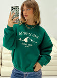 front view of model wearing Princess Polly Apres Ski Crew Neck Sweatshirt Green / Cream 