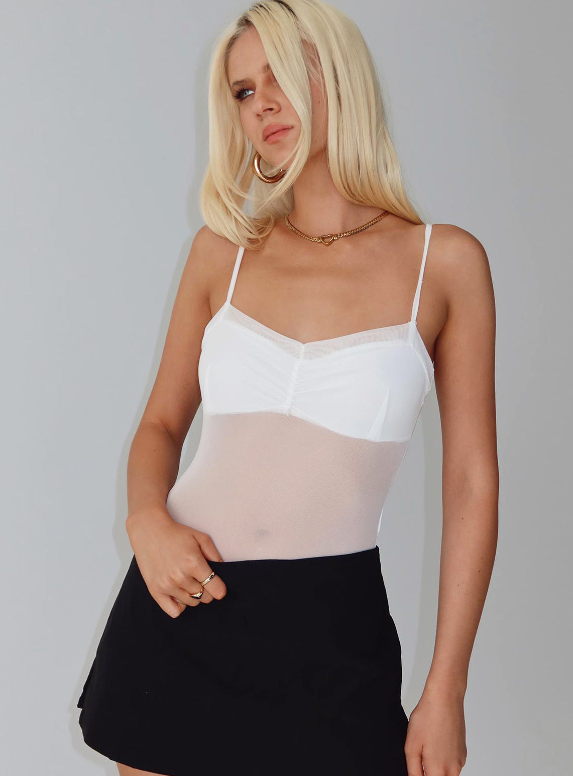 back view of model wearing Princess Polly In The Club Bodysuit White Sleeveless 