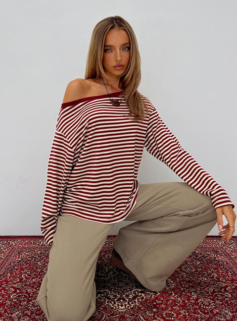 front view of model wearing Princess Polly Ralyssa Off Shoulder Long Sleeve Top Red Stripe Longline Jumpers 