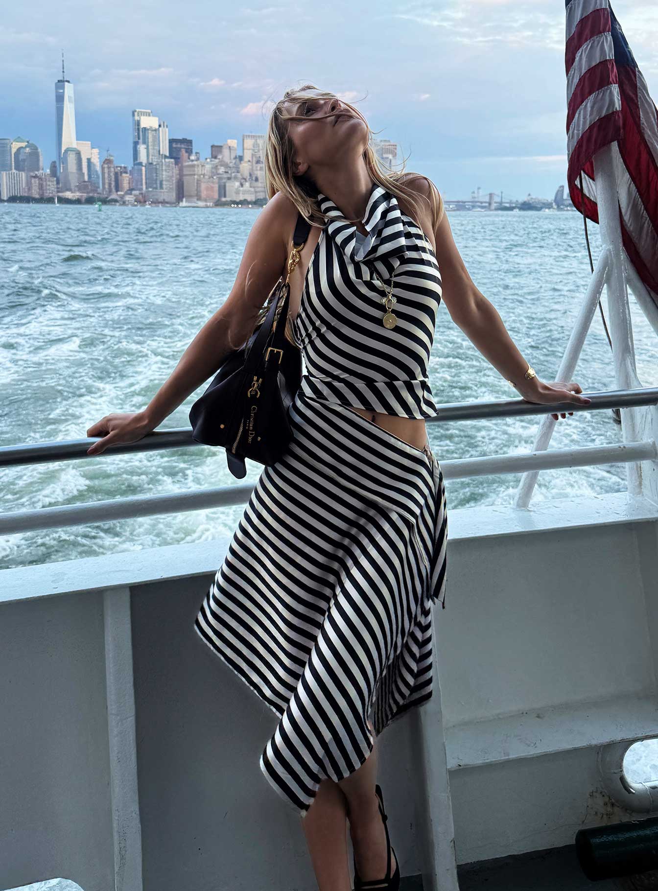 back view of model wearing Princess Polly Allure Midi Skirt Noir Stripe Midi Skirts 