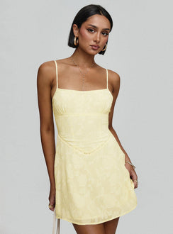 side view of model wearing Princess Polly South Of France Mini Dress Yellow Petite Square Neck 