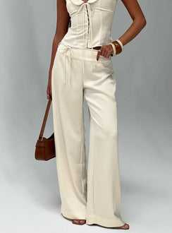 front view of model wearing Princess Polly Aubrette Satin Tie Pants Cream High Rise Pants 