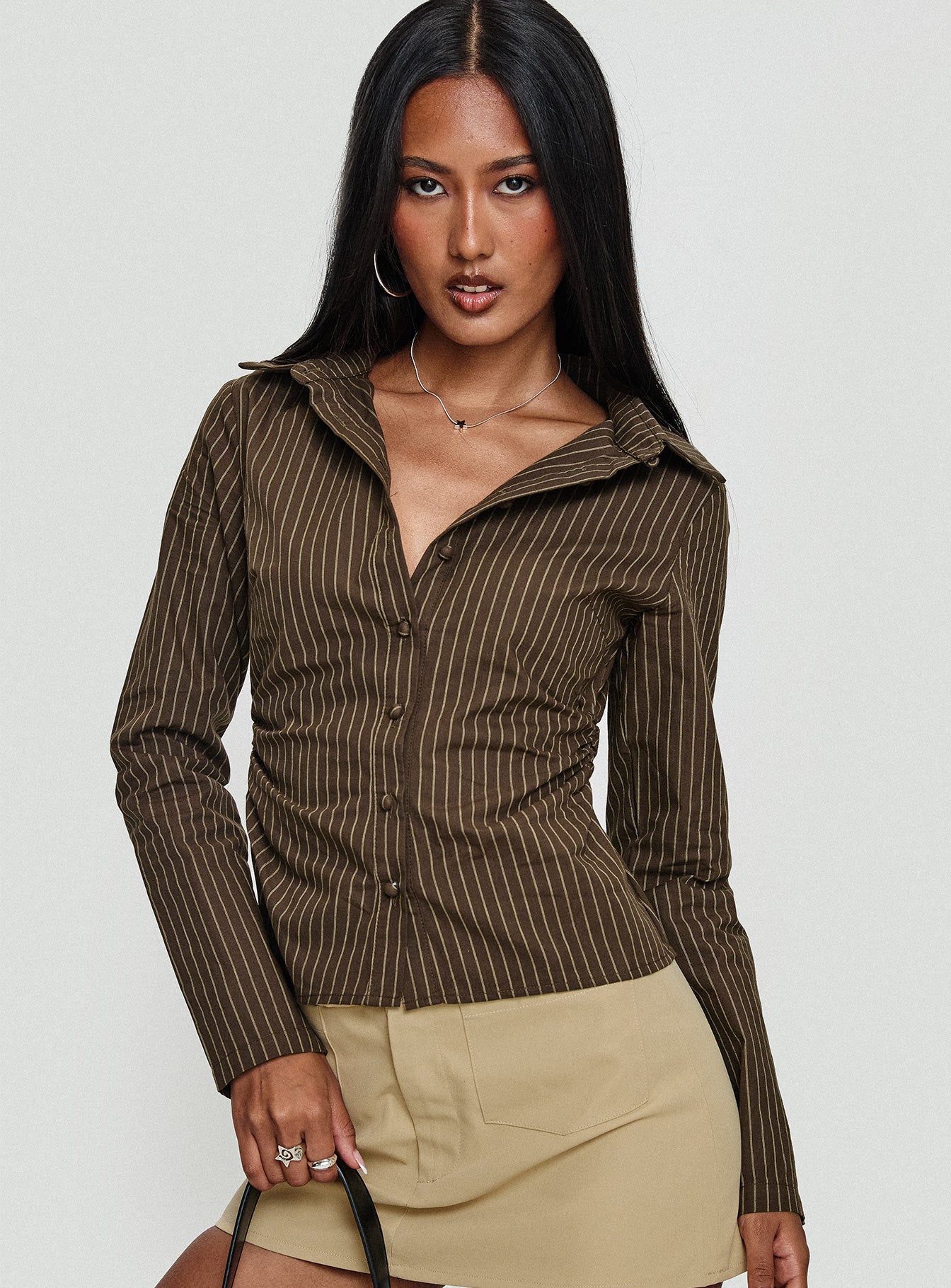 front view of model wearing Princess Polly Held My Hand Long Sleeve Top Brown Stripe Full Sleeves High Neck 