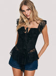 side view of model wearing Princess Polly Francia Frill Top Black Short Sleeves Square Neck 