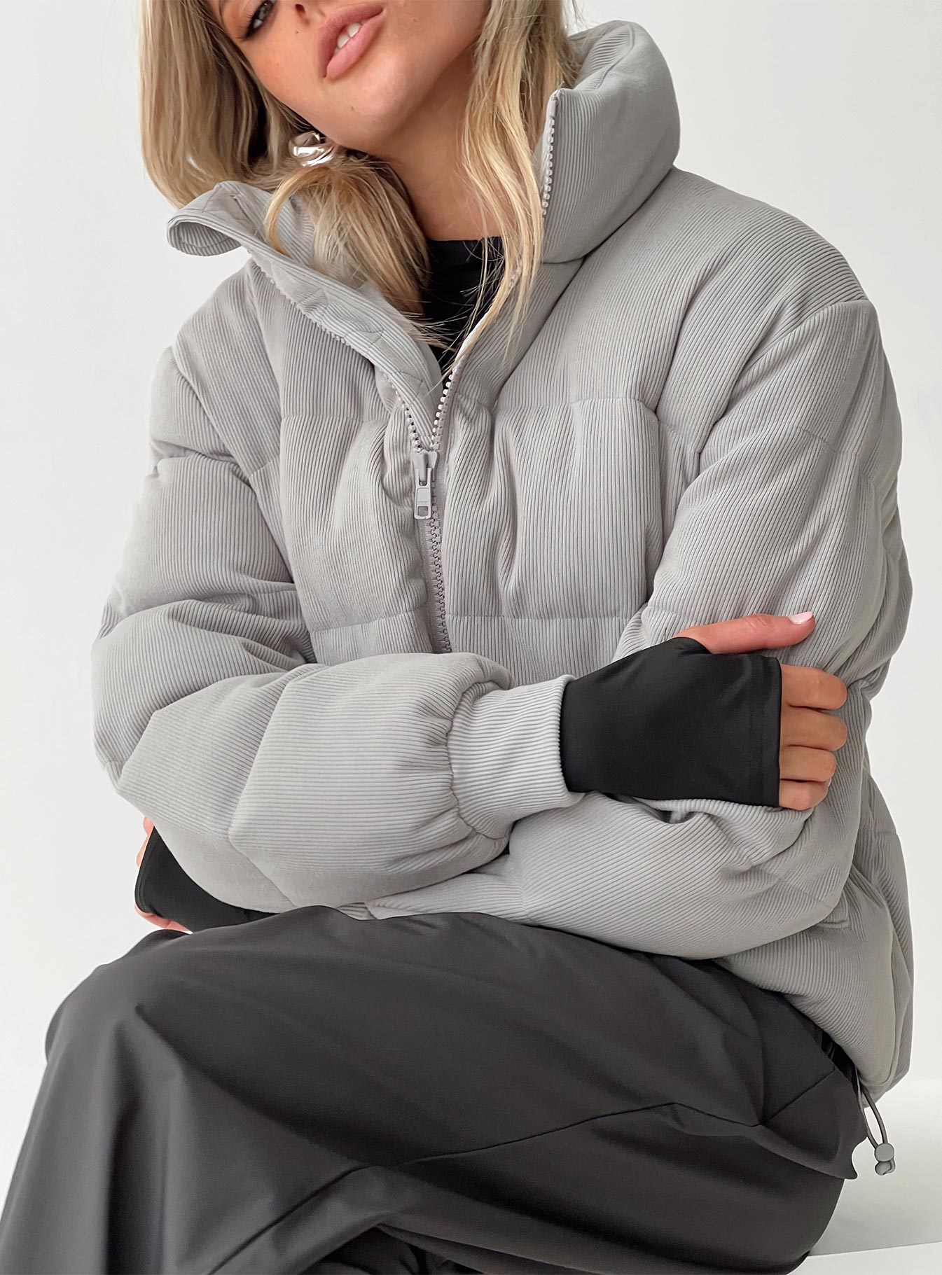 Ribbed puffer jacket High neckline, twin hip pockets, zip fastening down front, drawstring waist, elasticated cuffs