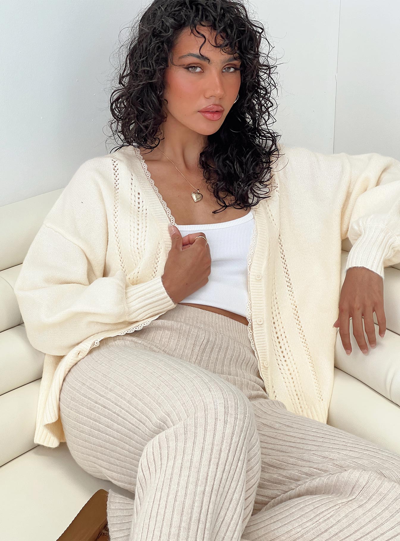 front view of model wearing Princess Polly Oakleigh Cardigan Cream Long 