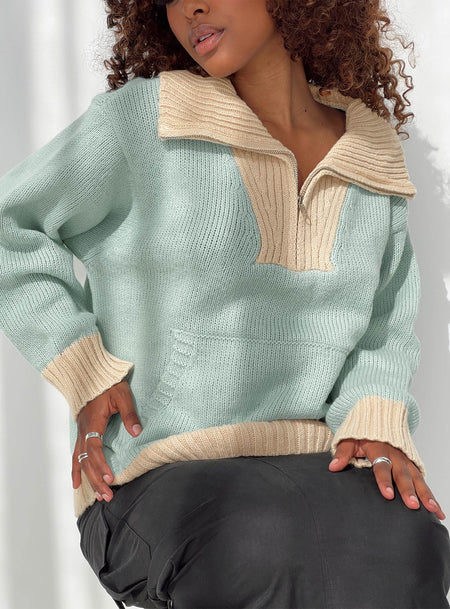 Quarter Zip Sweater  Oversized, ribbed cuffs and waist, single kangaroo pocket at front, high neck Zip fastening at front 
