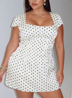 front view of model wearing Princess Polly Evangelie Ruched Mini Dress White Polka Curve Square Neck 