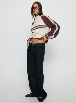 side view of model wearing Princess Polly Korinne Low Rise Bootleg Jeans Indigo Low Rise Jeans 