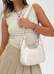 Shoulder bag Adjustable shoulder strap  Gold-toned hardware   Zip fastening  Single internal zip pocket  Flat base 