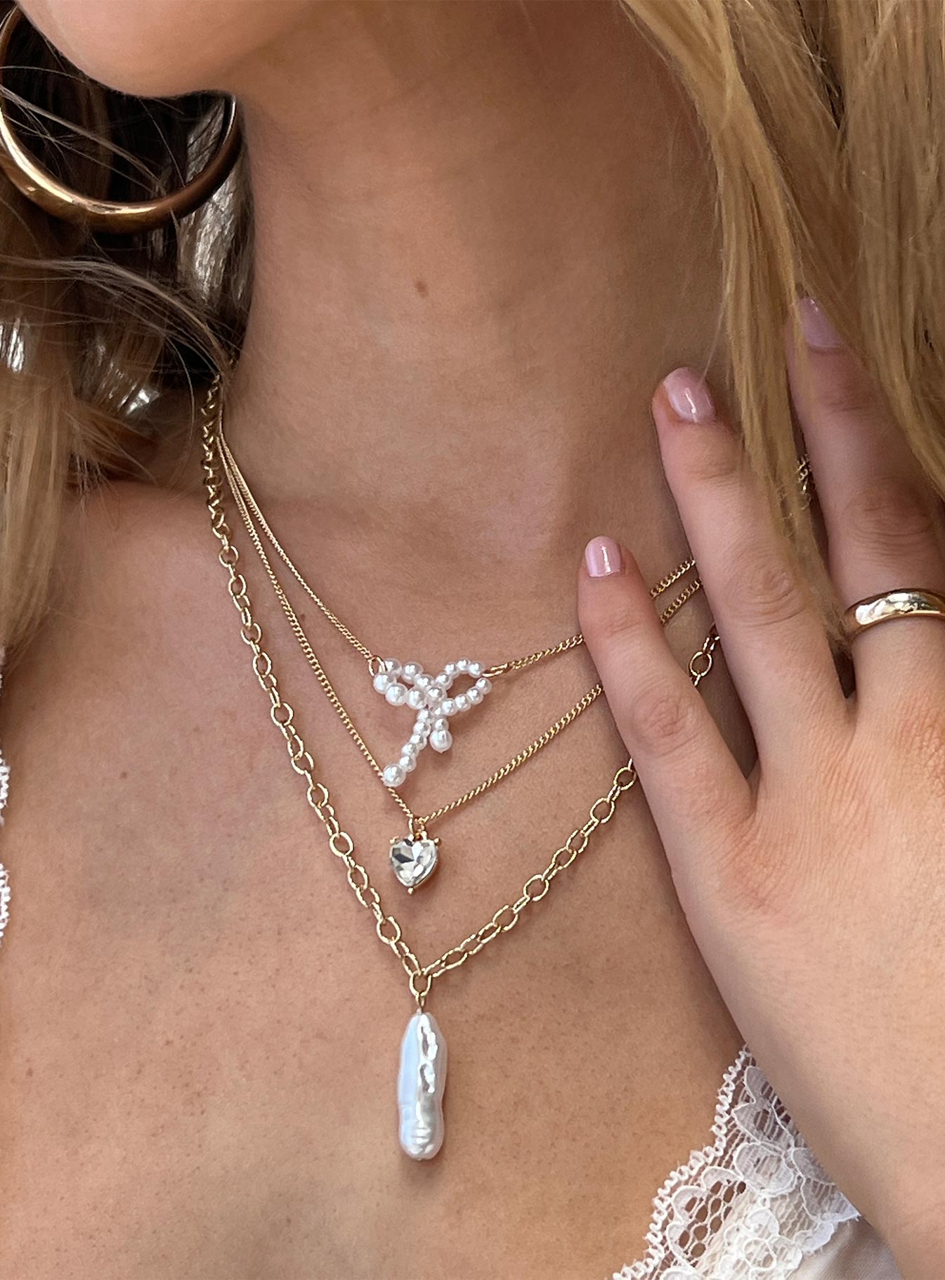 Gold-toned necklace set Pearl and diamante detail, three fixed chains - these cannot be worn separately, lobster clasp fastening